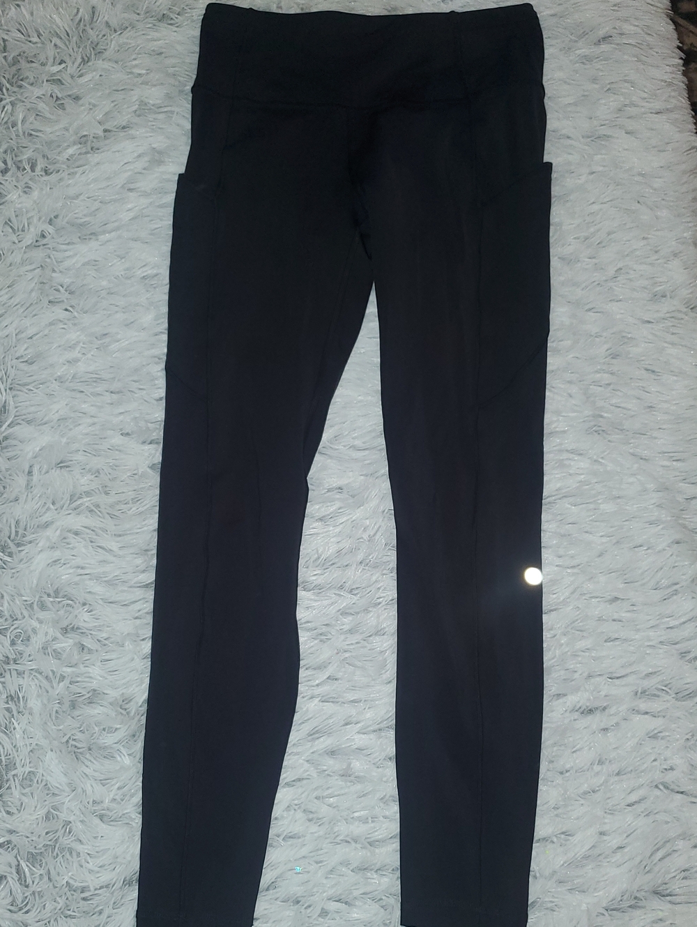 *lululemon athletica Black High-Rise Leggings with Side Pockets*